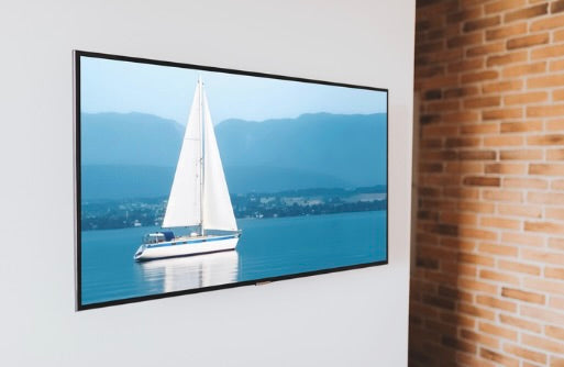 White Sailboat on calm blue waters of Lake Geneva wall decor