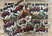 Winter mountain adventures in a 4 x 4 off road vehicle wrapping paper. FSC certified, uncoated 120gsm, 500mm x700mm