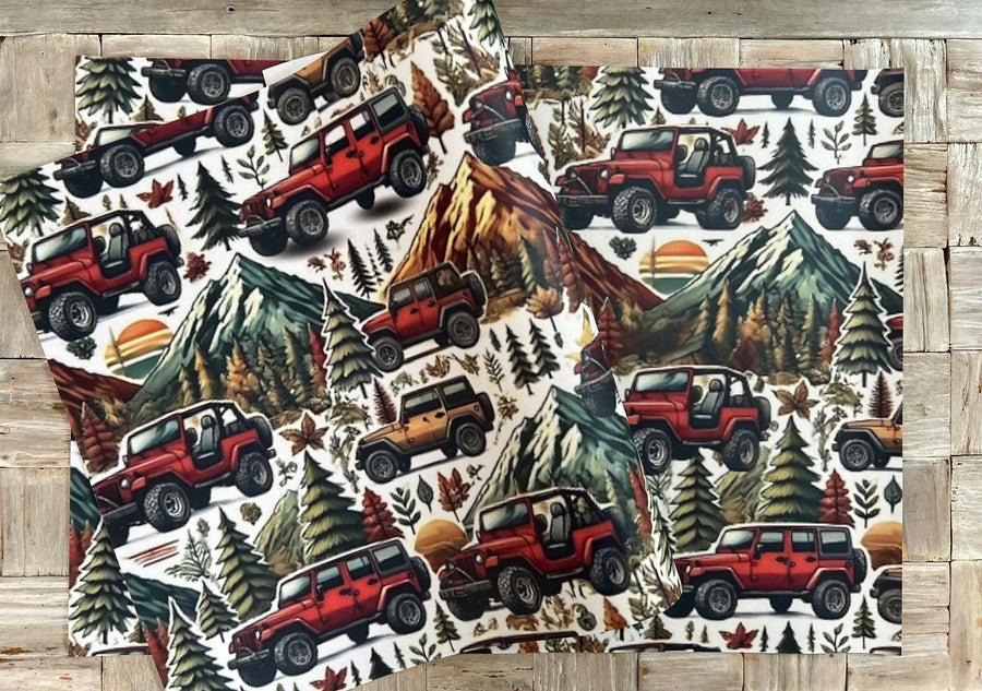 Winter mountain adventures in a 4 x 4 off road vehicle wrapping paper. FSC certified, uncoated 120gsm, 500mm x700mm