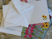 Flowery houses in bloom greeting card with hand embossed envelope. Colourful, FSC certified with printed sunflowers inside. Blank for your message