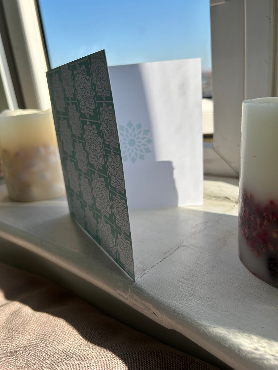 Geometric flower in soft focus on inside right.