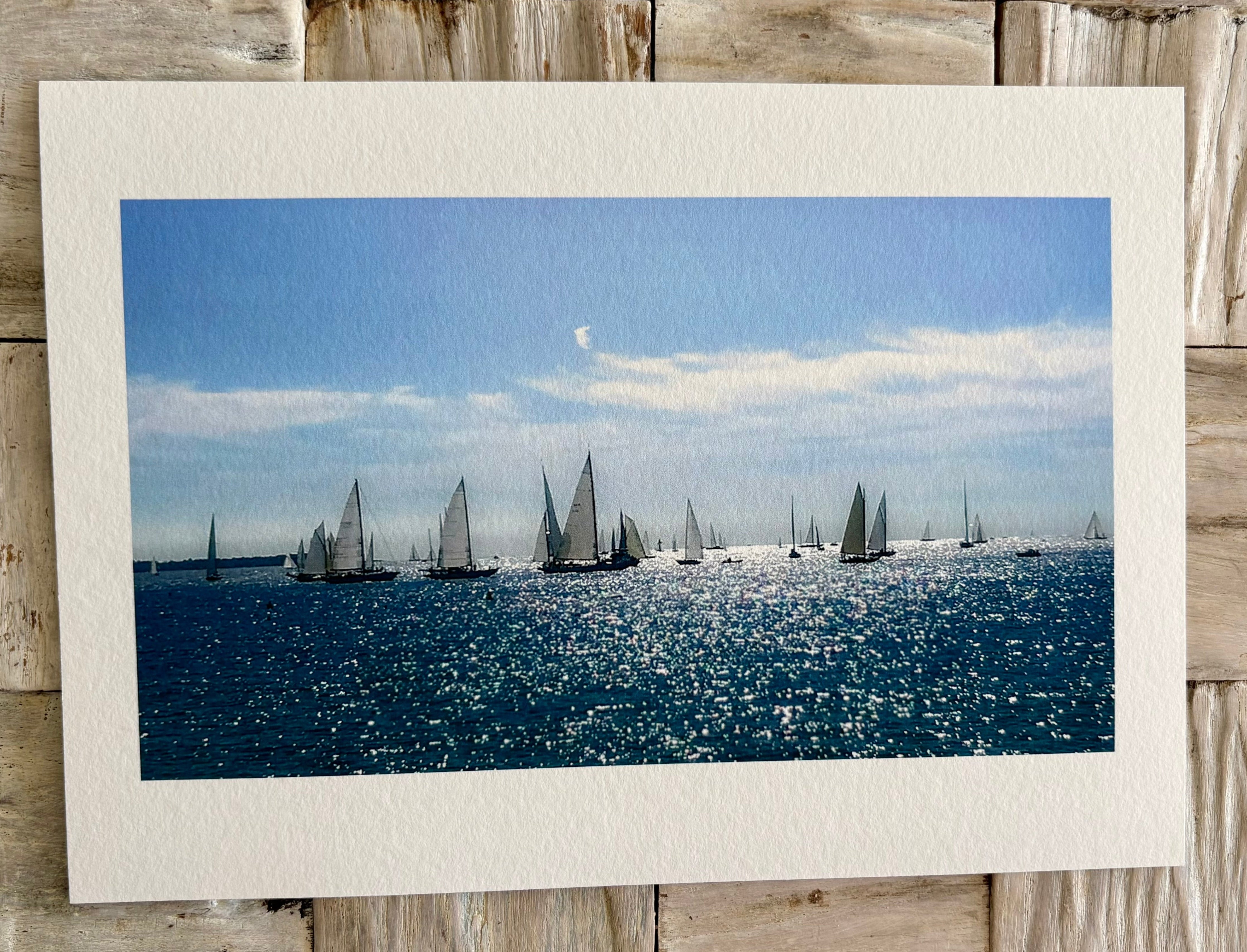 Unframed photograph of sailboats on the sparkling blue Mediterranean sea  taken in Cannes, France