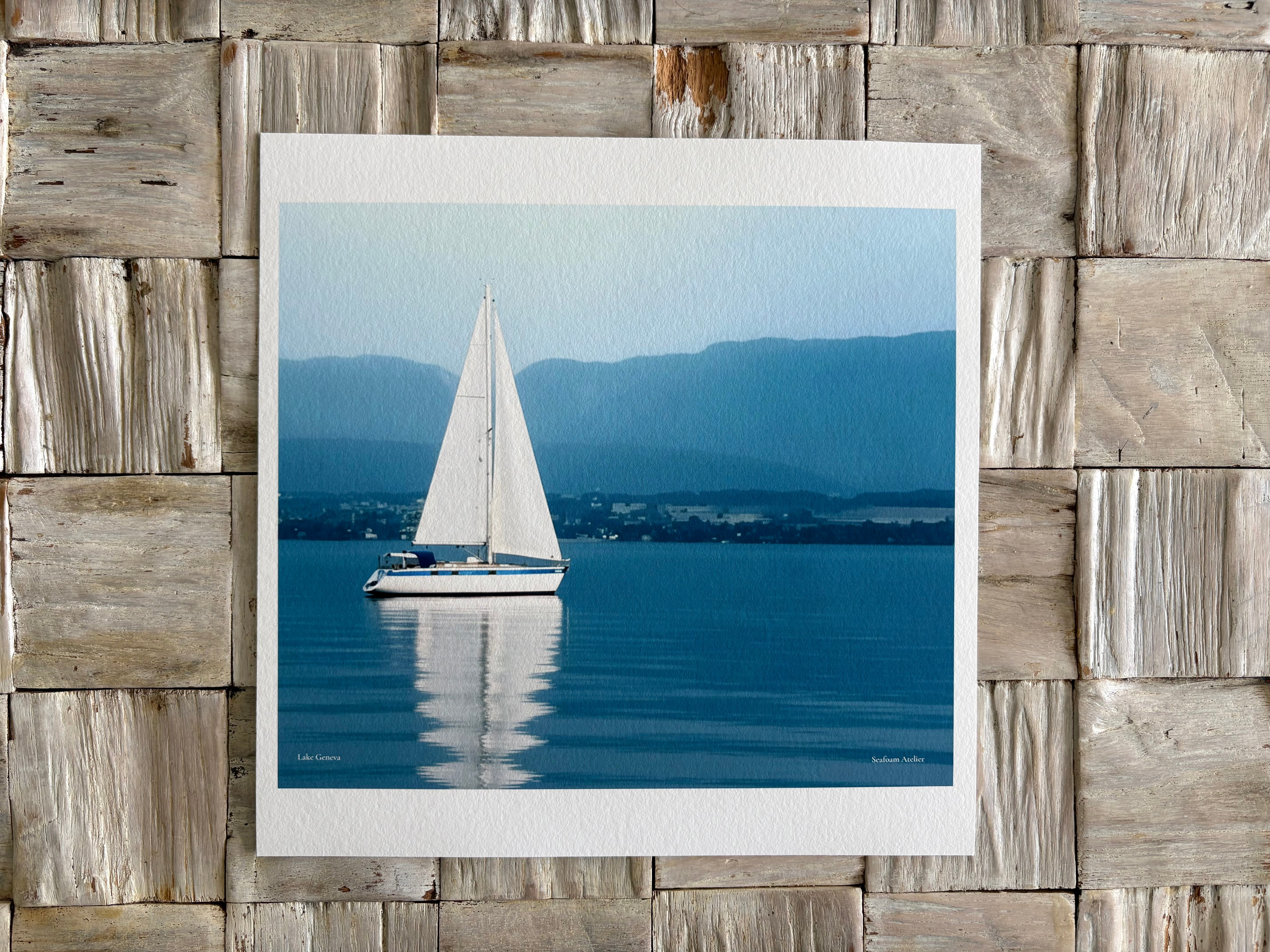 White Sailboat on calm blue waters of Lake Geneva wall decor