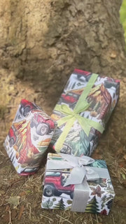 Winter mountain adventures in a 4 x 4 off road vehicle wrapping paper. FSC certified, uncoated 120gsm, 500mm x700mm